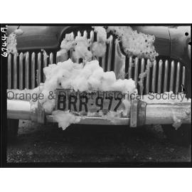 Number plate BRR 972 covered with snow