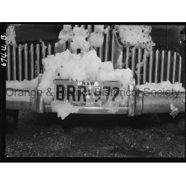 Number plate BRR 972 covered with snow