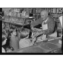 Mr J P Jaeger in his shop in Churchill Avenue