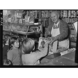 Mr J P Jaeger in his shop in Churchill Avenue