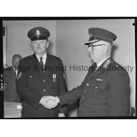 Presentation of a Long Service and Conduct Medal