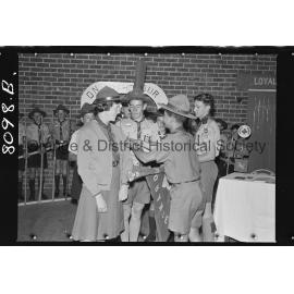 Joan Wheeler receiving Queen's badge for her brother John, who died in the Blue Mountains