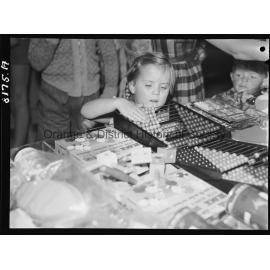 Young children at Christmas Shopping in Woolworths