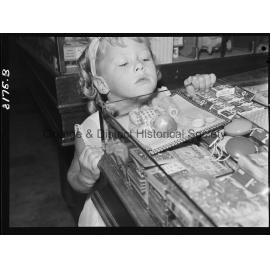 Young children at Christmas Shopping in Woolworths
