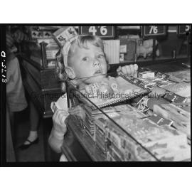 Young children at Christmas Shopping in Woolworths