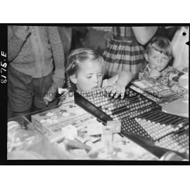 Young children at Christmas Shopping in Woolworths