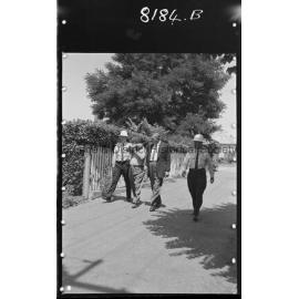 Mr Frederick Johnston being led into court to be charged with the murder of his wife