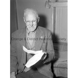 George Rauchle with Empire Day cheque