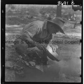 Scouts panning for gold