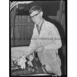 John Smith checks his Morris Minor