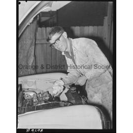 John Smith checks his Morris Minor