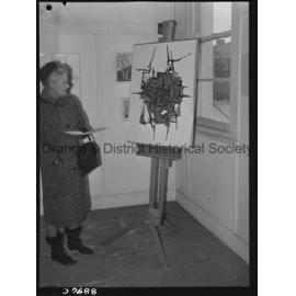 Art display, Mrs Sam Campbell studies abstract painting