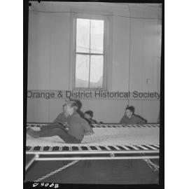 Billy Sarclat on trampoline at Police Citizens Boys' Club