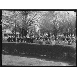 Legacy Week, people at Cenotaph watch on