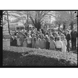 Legacy Week, people at Cenotaph watch on