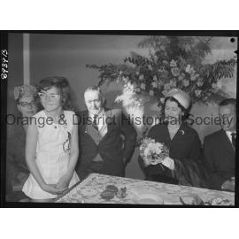 Kathleen Ratcliffe presents posy to Lady Moses