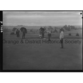 Visiting golfers play Orange Club