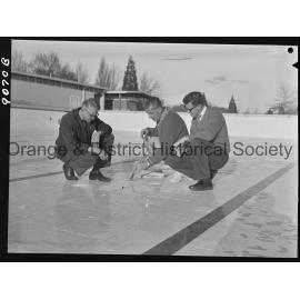 Inspecting Olympic pool