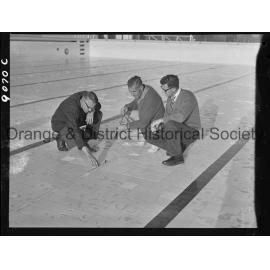 Inspecting Olympic pool