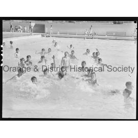Swimmers at Olympic pool