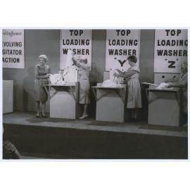 Which one washes the whitest: actor Gwen Plumb supervises a washing machine comparison