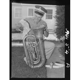 Elwyn McAlister cleaning his tuba