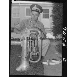 Elwyn McAlister cleaning his tuba