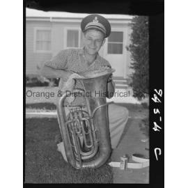 Elwyn McAlister cleaning his tuba
