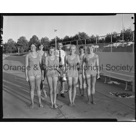Orange women's relay swim team