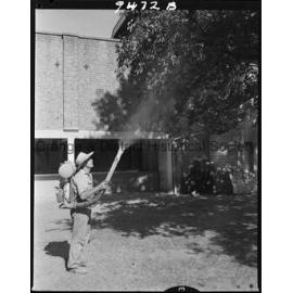 Geoff Fanning spraying trees at the racecourse