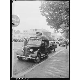 London taxi in Orange