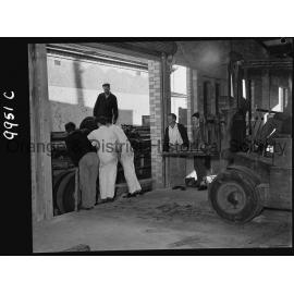 Unpacking the new printing press at the Central Western Daily