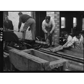 Unpacking the new printing press at the Central Western Daily