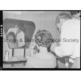 Hair stylist visits Orange