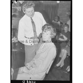 Hair stylist visits Orange