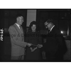 Cherry Blossom Queen candidate watches handover of festival cheque