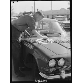 Adjusting number on Triumph for big car race