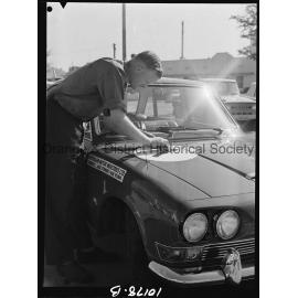 Adjusting number on Triumph for big car race