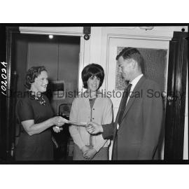 Cherry Blossom Queen candidate, festival cheque