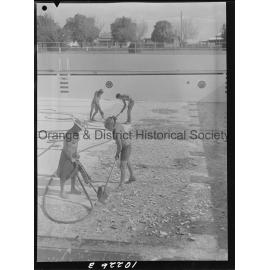 Olympic pool diving board gets a paint over