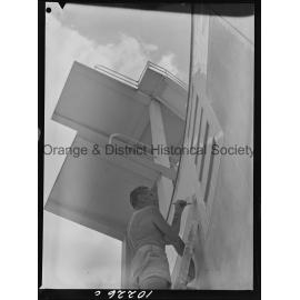 Olympic pool diving board gets a paint over