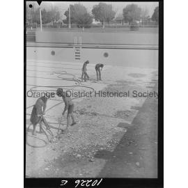 Olympic pool diving board gets a paint over