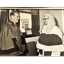 Mayor of Orange, Ronald John Hill greets a visiting district magistrate