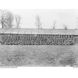 Group portrait of the NCOs of the 45th Battalion, Meteren, France, 6 March 1918.