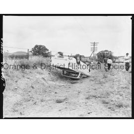 Utility overturned on Cargo Road