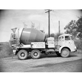 Truck with load of blue metal