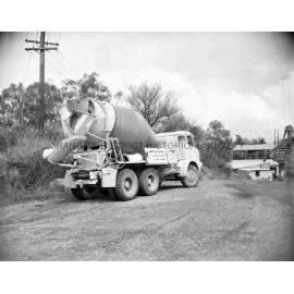 Truck with load of blue metal