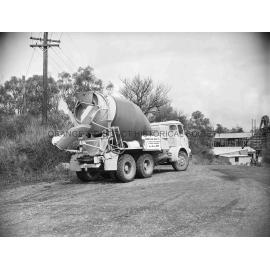 Truck with load of blue metal