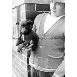 Man with puppy