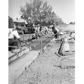 Men working on road in Sampson Street